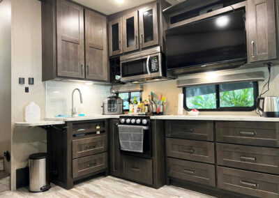 Interior of a modern kitchen in a luxury fifth wheel trailer