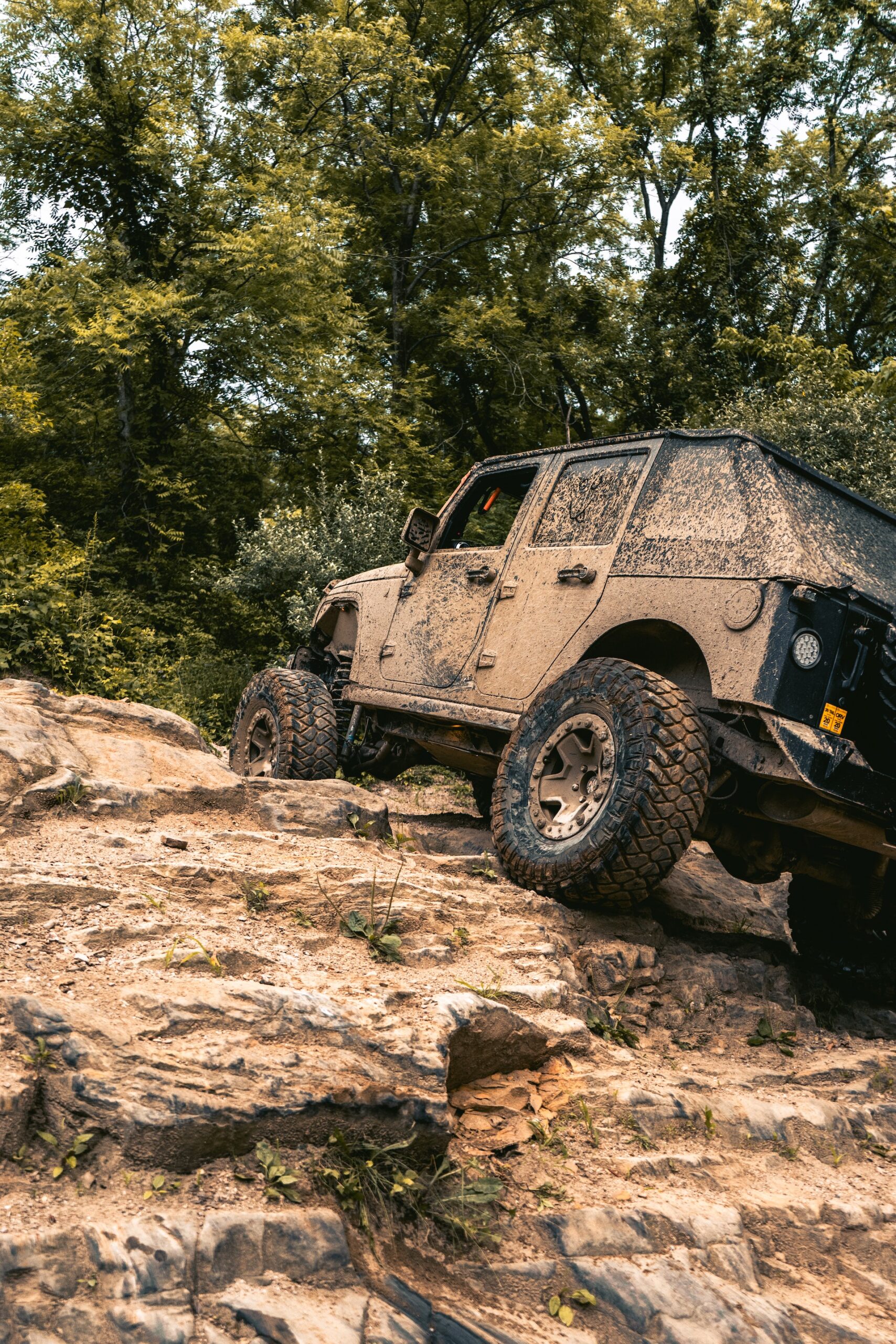 Muddy Jeep on Rocks